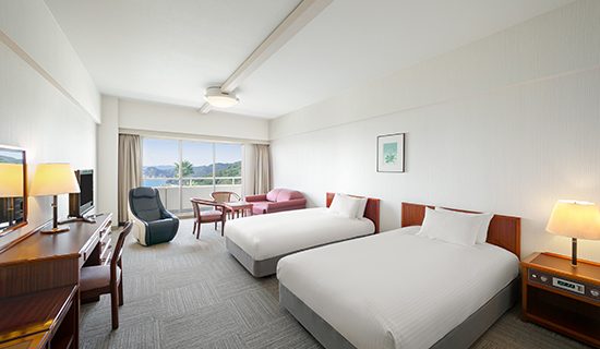 Classic Room: 2 single beds, 1 extra bed, ocean view, massage machine